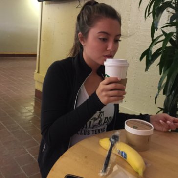 Ethnic studies freshman Haley Fagerberg drinks a cup of Starbucks coffee before heading to the gym.
